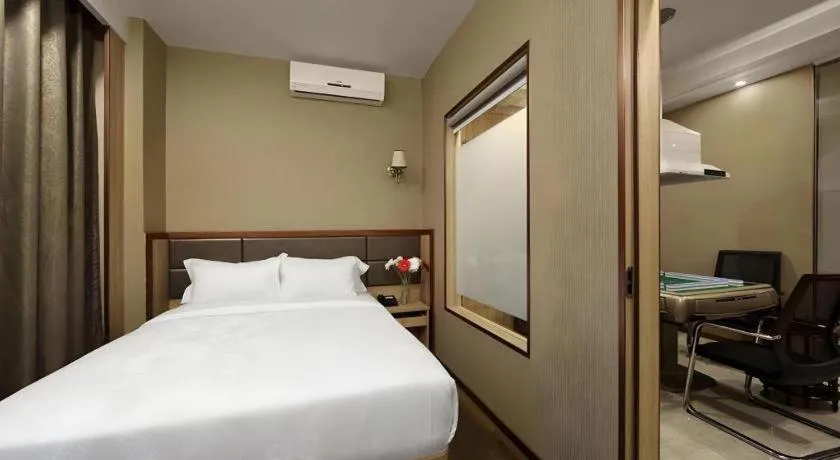 Bed in Hanyong Hotel Shenzhen International Exhibition Center