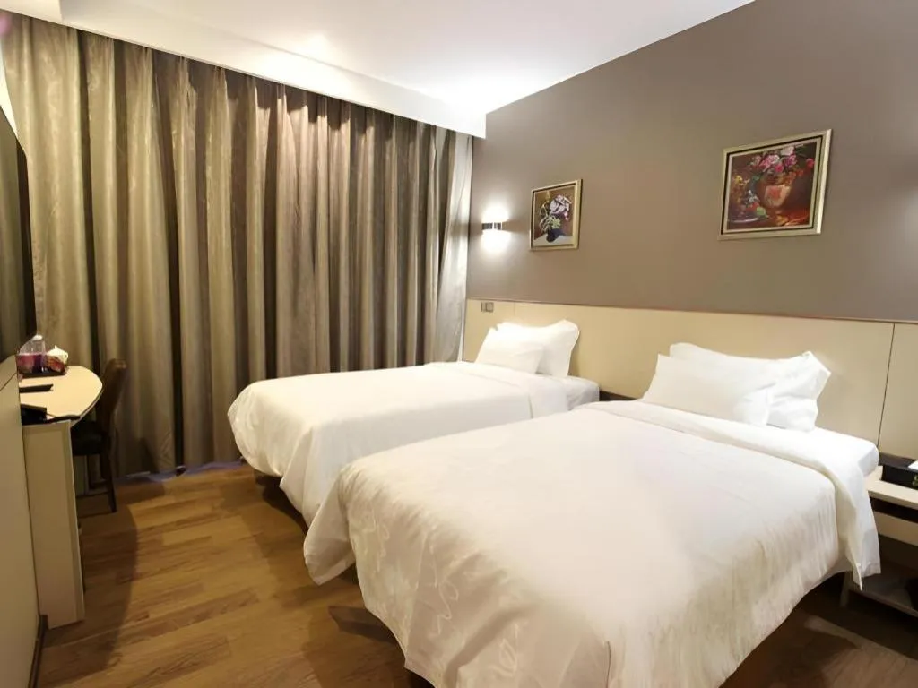 Bed in Hanyong Hotel Shenzhen International Exhibition Center