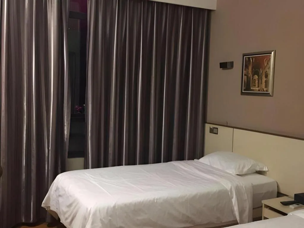 Bed in Hanyong Hotel Shenzhen International Exhibition Center