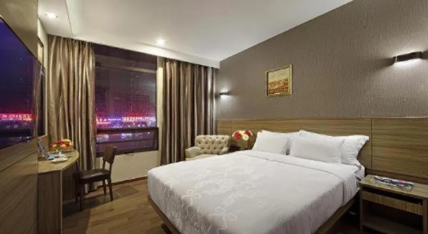 Bed in Hanyong Hotel Shenzhen International Exhibition Center