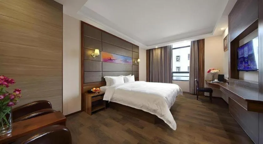 Bed in Hanyong Hotel Shenzhen International Exhibition Center