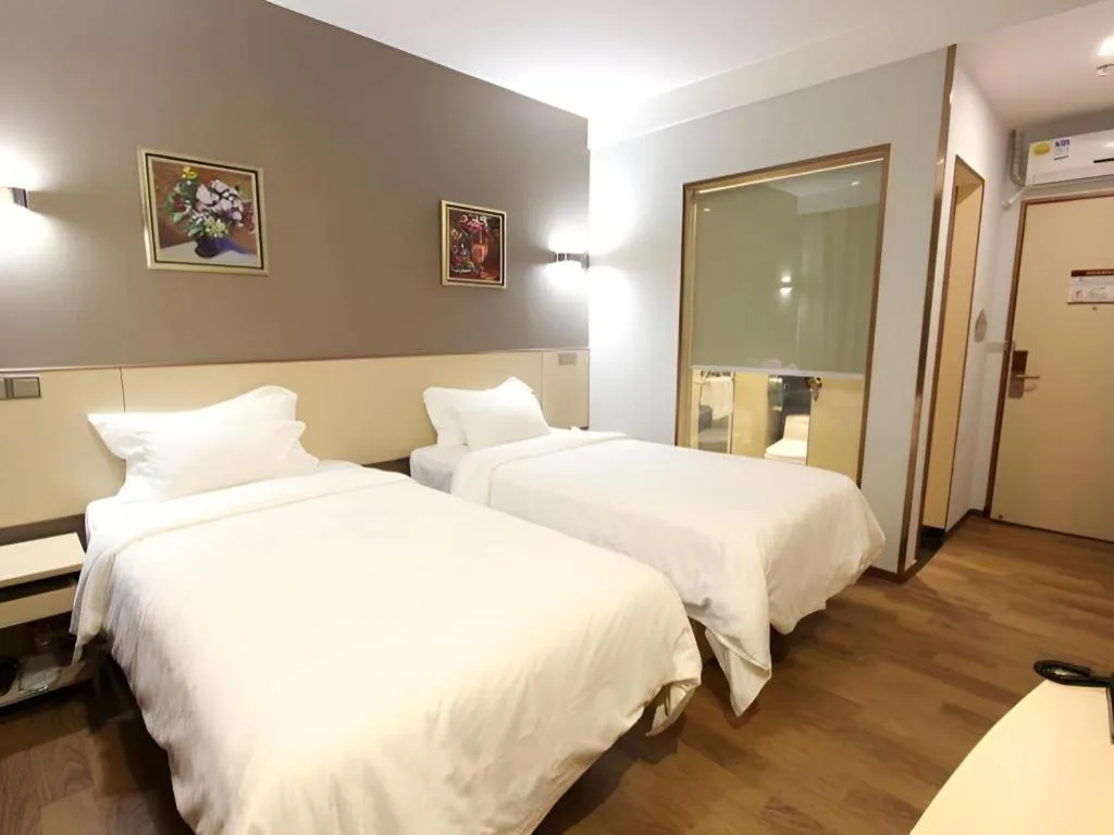 Bed in Hanyong Hotel Shenzhen International Exhibition Center