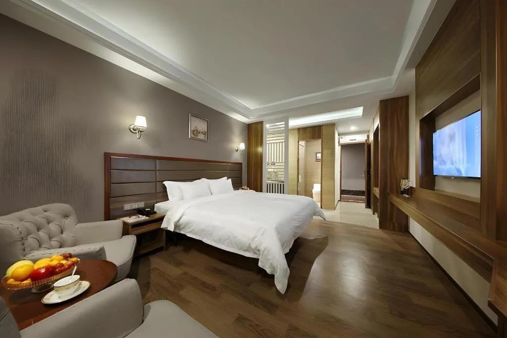 Bed in Hanyong Hotel Shenzhen International Exhibition Center