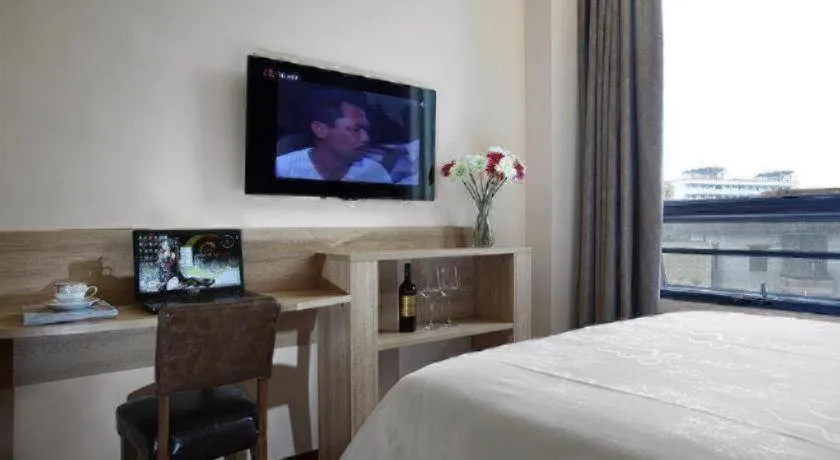 Bed in Hanyong Hotel Shenzhen International Exhibition Center