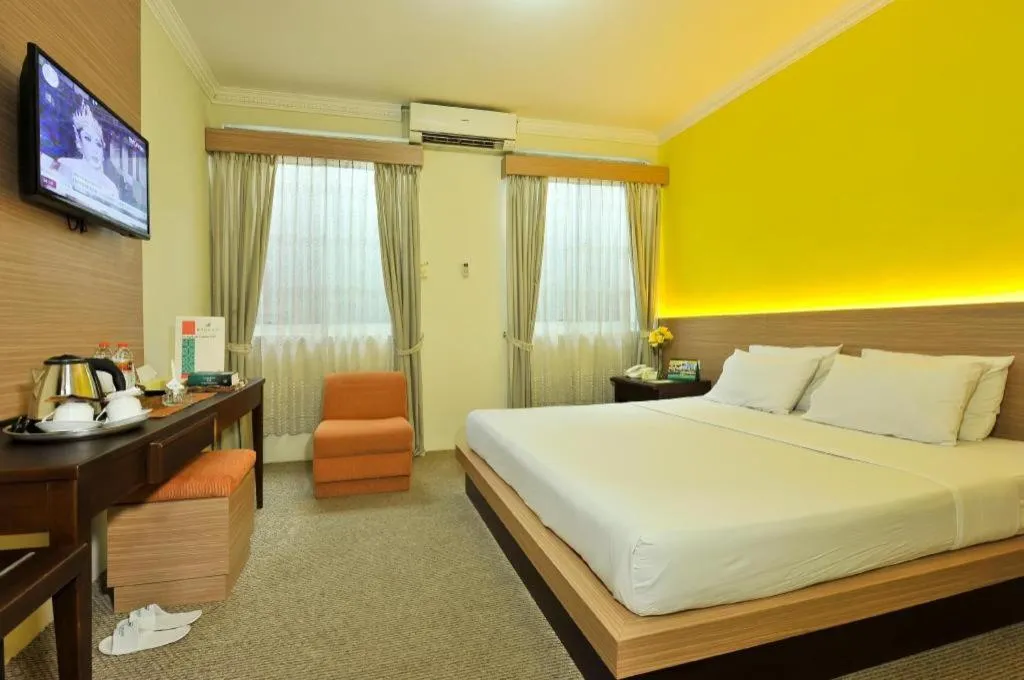 Bed in Muria Hotel