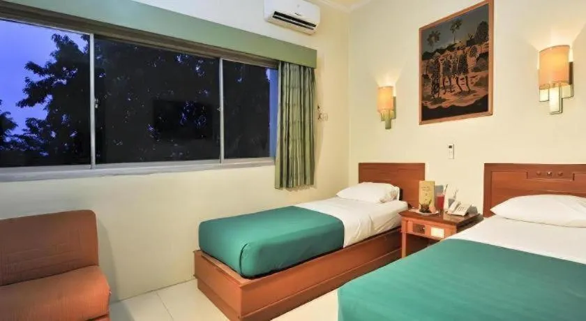 Bed in Muria Hotel