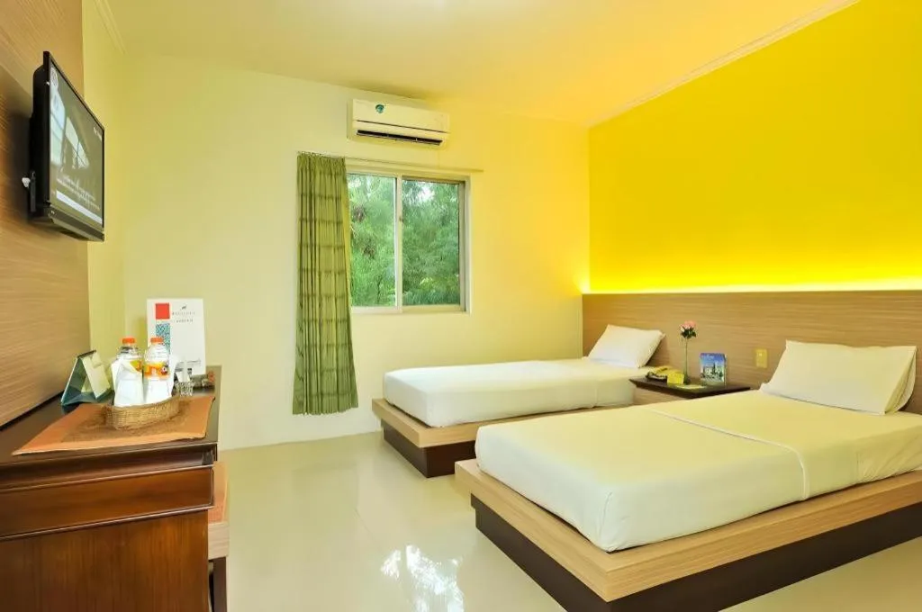 Bed in Muria Hotel