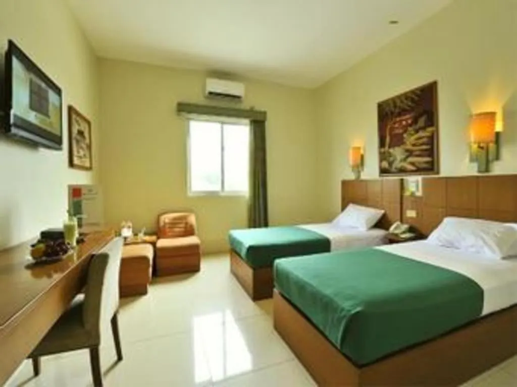 Bed in Muria Hotel