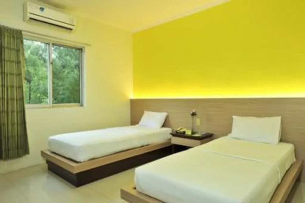 Bed in Muria Hotel