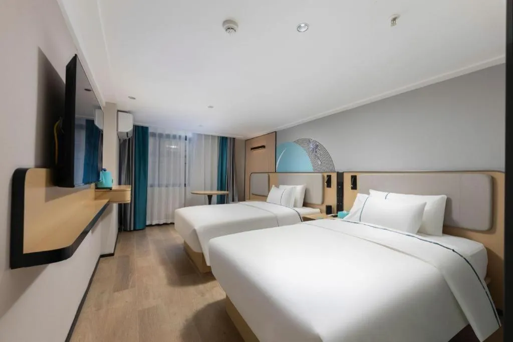 Bed in City Comfort Inn Hengyang Dayang Department Lianhu Plaza