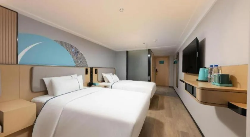 Bed in City Comfort Inn Hengyang Dayang Department Lianhu Plaza