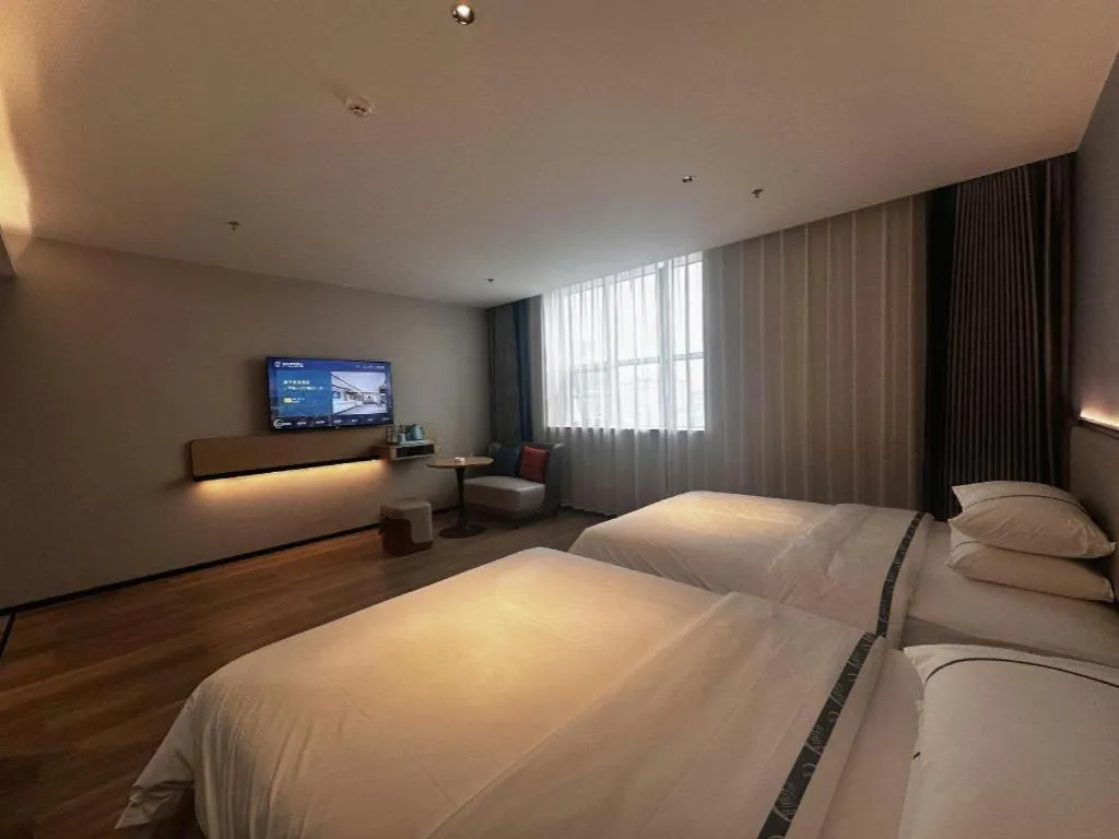 Bed in City Comfort Inn Hengyang Dayang Department Lianhu Plaza