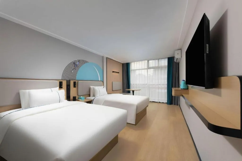 Bed in City Comfort Inn Hengyang Dayang Department Lianhu Plaza