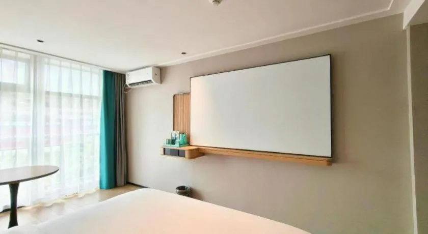 Bed in City Comfort Inn Hengyang Dayang Department Lianhu Plaza