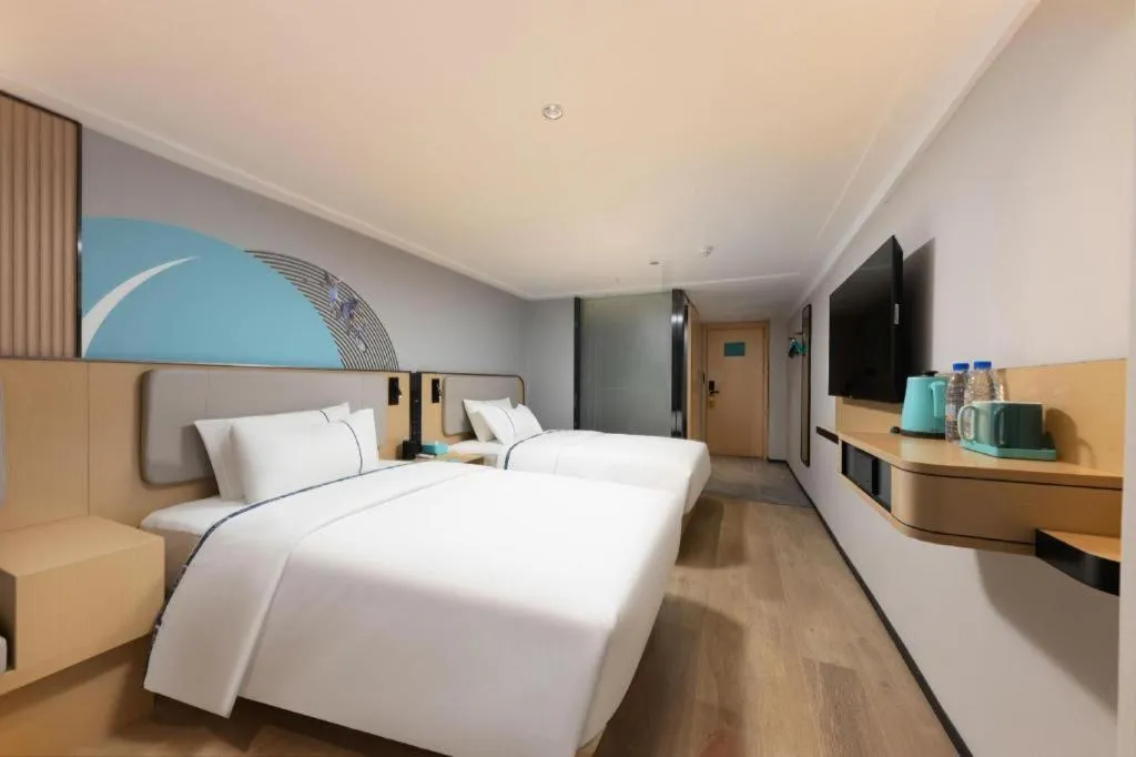 Bed in City Comfort Inn Hengyang Dayang Department Lianhu Plaza