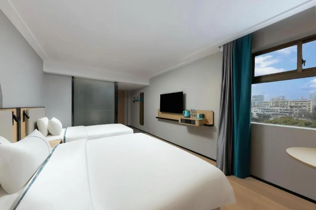 Bed in City Comfort Inn Hengyang Dayang Department Lianhu Plaza