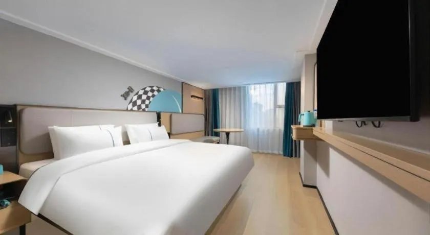 Bed in City Comfort Inn Hengyang Dayang Department Lianhu Plaza