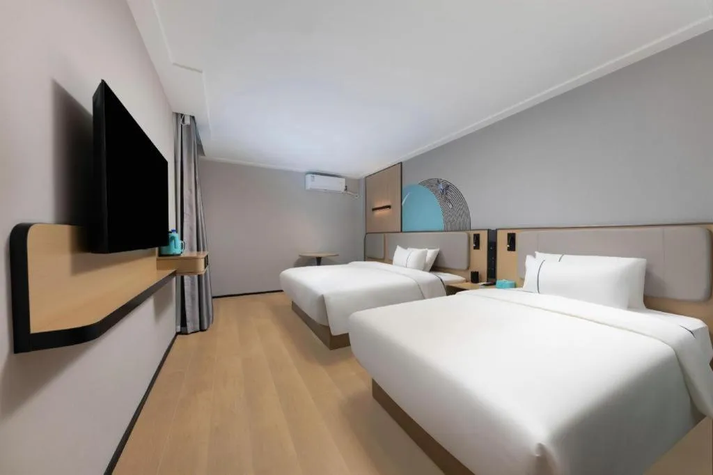 Bed in City Comfort Inn Hengyang Dayang Department Lianhu Plaza