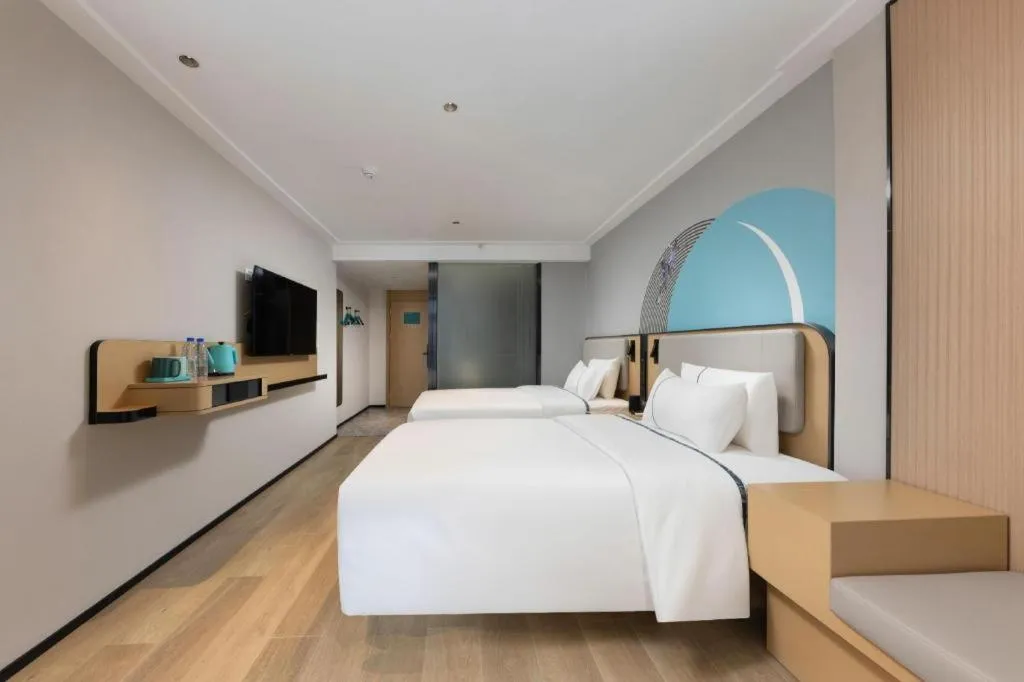 Bed in City Comfort Inn Hengyang Dayang Department Lianhu Plaza