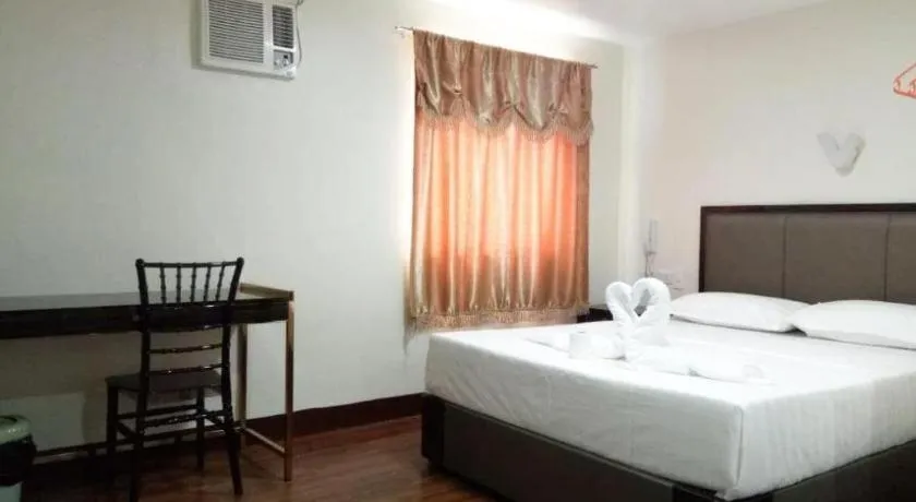 Bed in Meaco Royal Hotel- ILagan