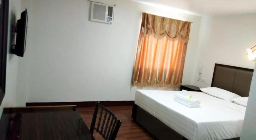 Bed in Meaco Royal Hotel- ILagan