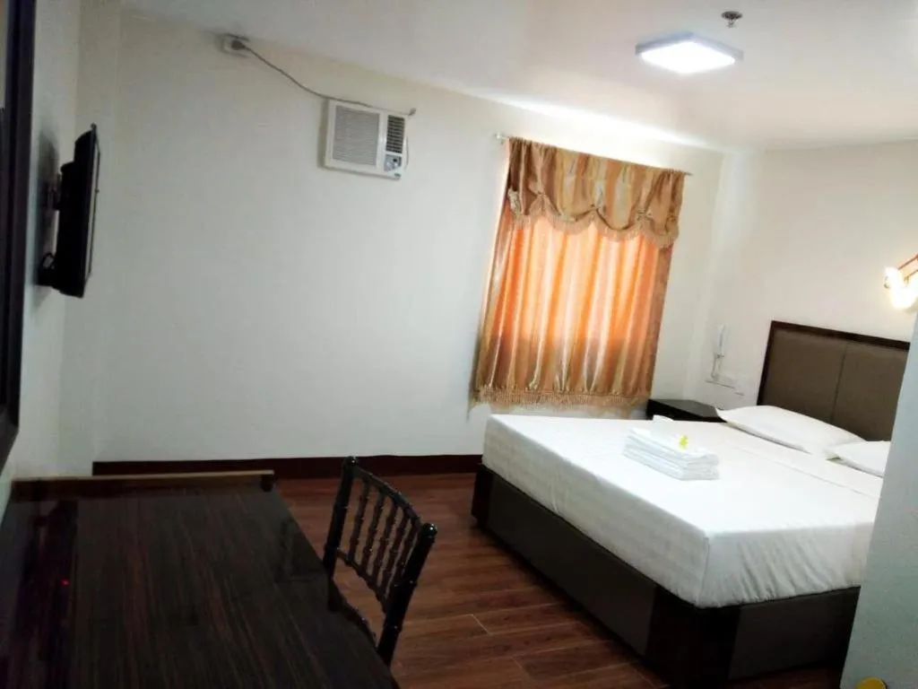 Bed in Meaco Royal Hotel- ILagan