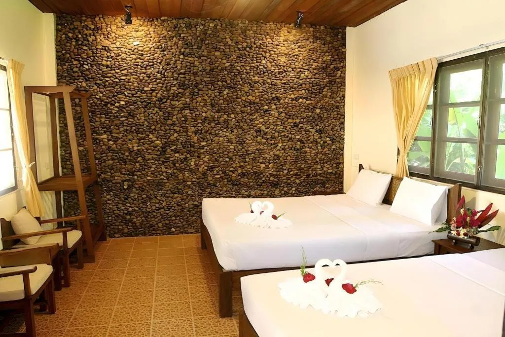 Bed in Pai Hotsprings Spa Resort