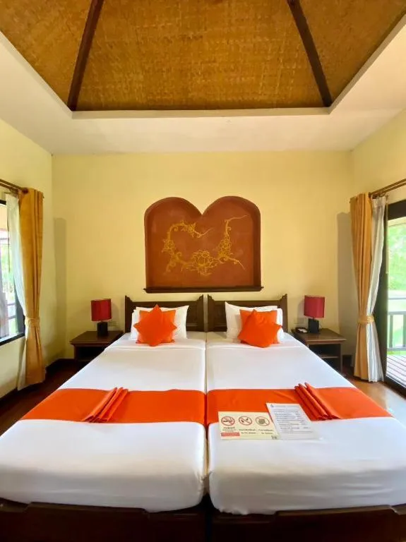 Bed in Pai Hotsprings Spa Resort