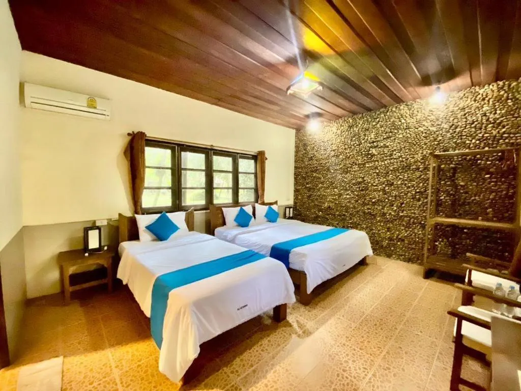 Bed in Pai Hotsprings Spa Resort