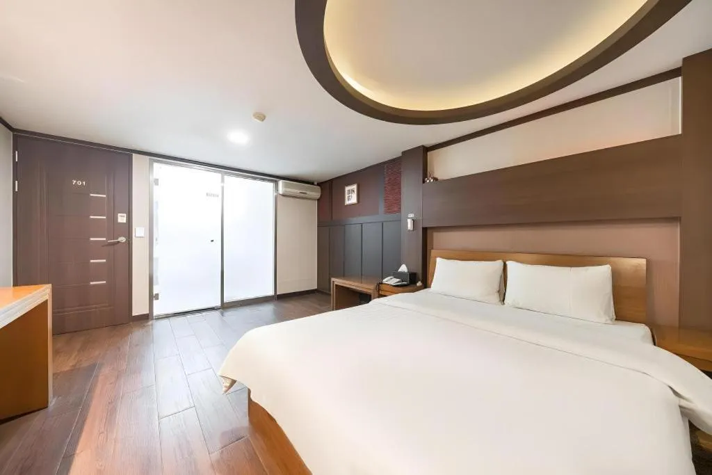 Bed in Hotel J Suwon