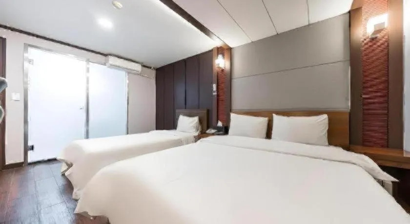 Bed in Hotel J Suwon