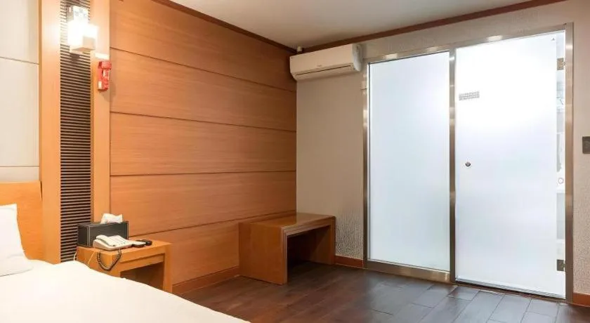 Bed in Hotel J Suwon