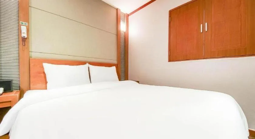 Bed in Hotel J Suwon