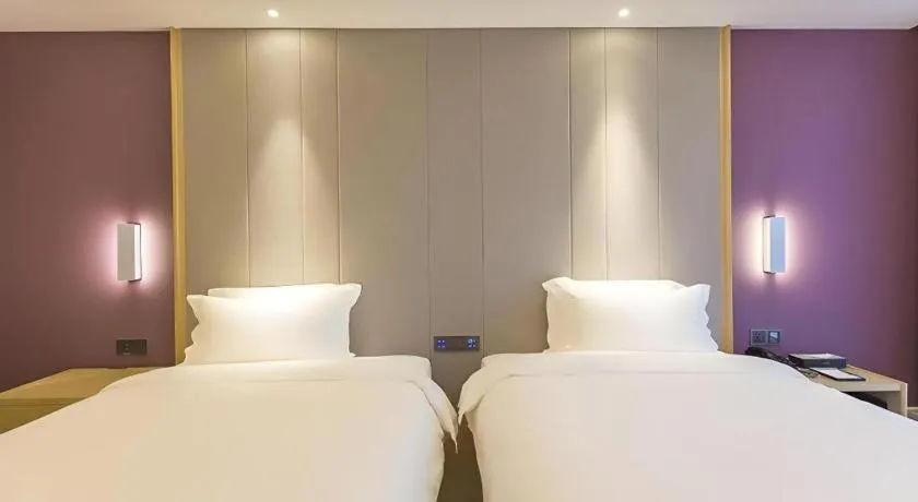 Bed in Lavande Hotels Guangzhou Zhihui City