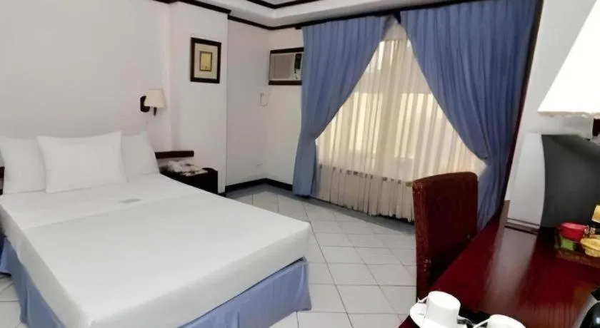 Bed in Soledad Suites