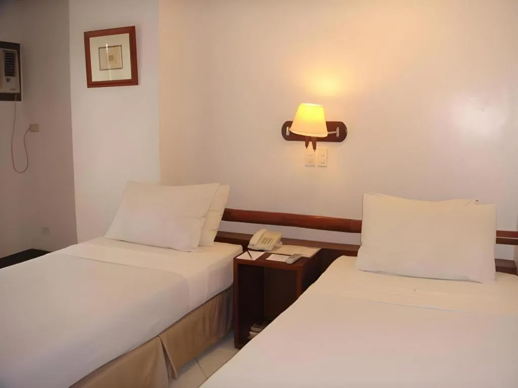 Bed in Soledad Suites