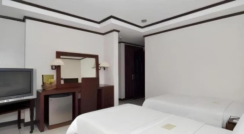 Bed in Soledad Suites