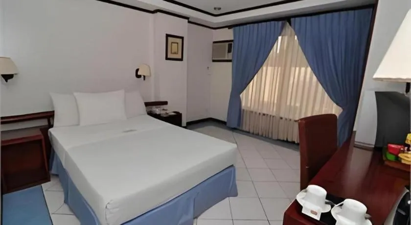 Bed in Soledad Suites