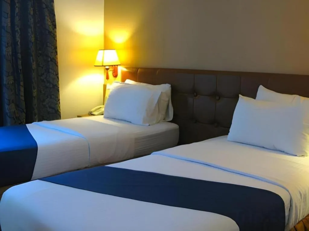 Bed in Blueberry Tourist Hotel