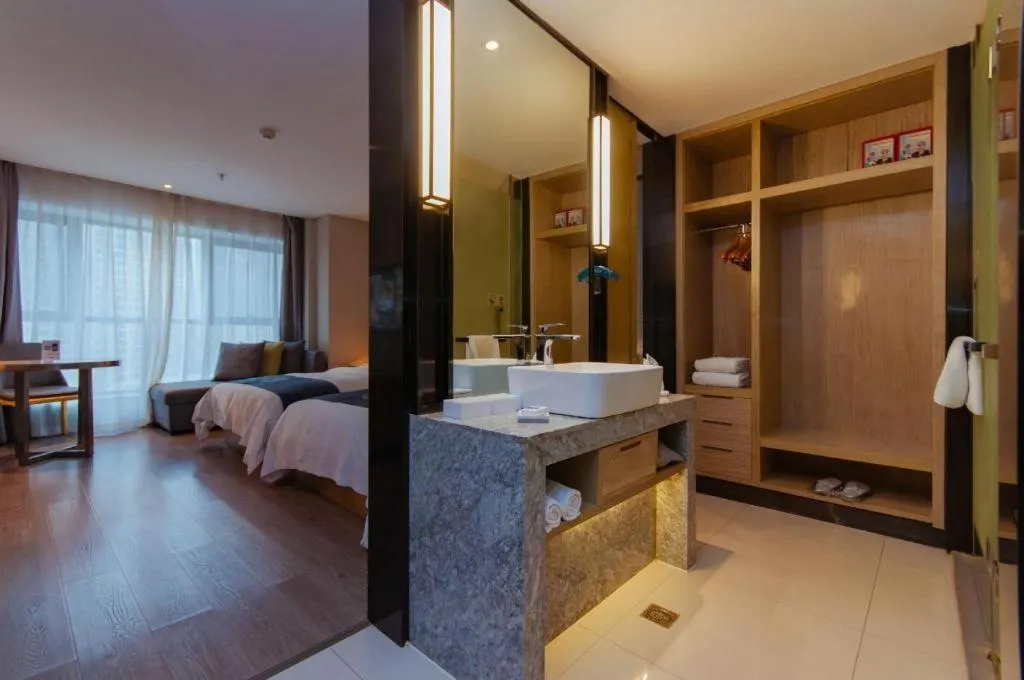 Bed in Echarm Hotel Guiyang International Convention & Exhibition Center