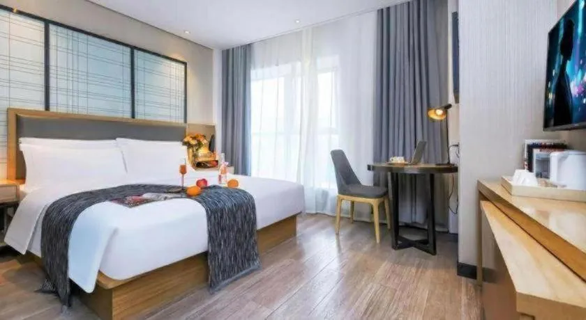 Bed in Echarm Hotel Guiyang International Convention & Exhibition Center