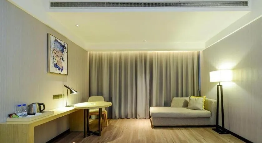 Bed in Echarm Hotel Guiyang International Convention & Exhibition Center