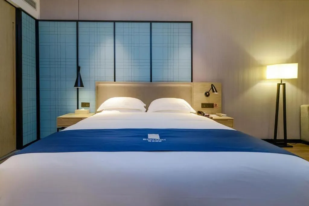 Bed in Echarm Hotel Guiyang International Convention & Exhibition Center