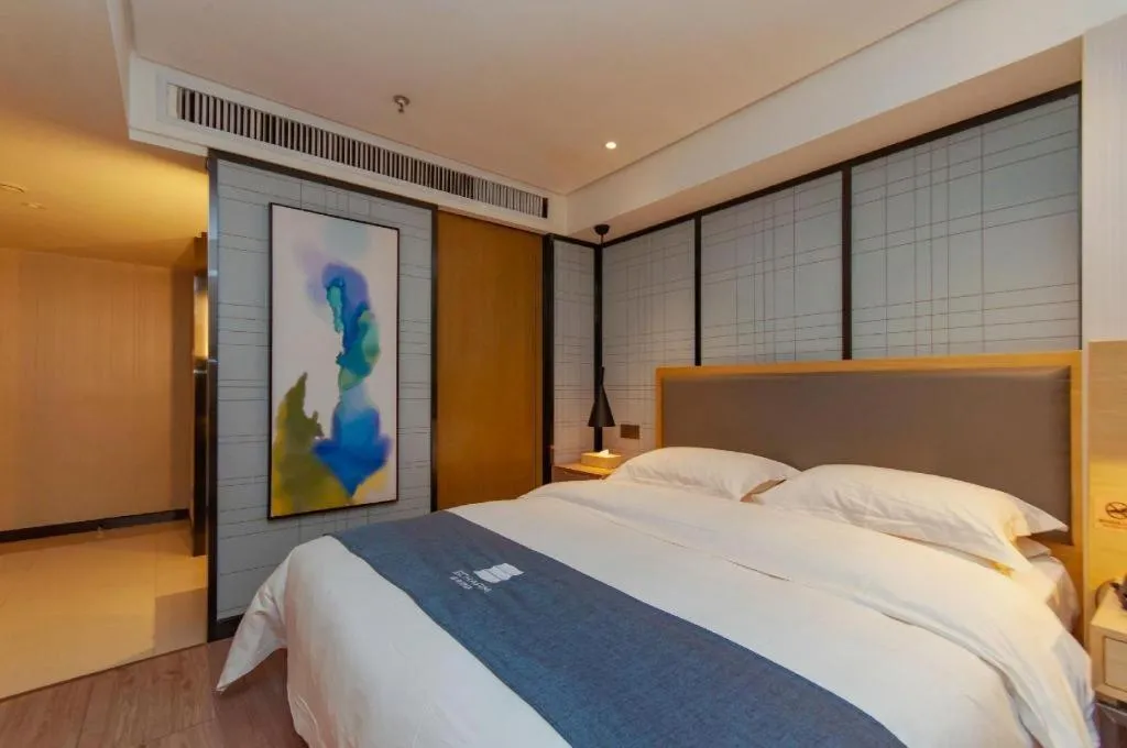 Bed in Echarm Hotel Guiyang International Convention & Exhibition Center