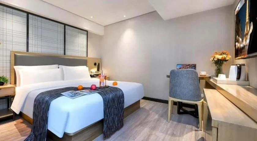 Bed in Echarm Hotel Guiyang International Convention & Exhibition Center