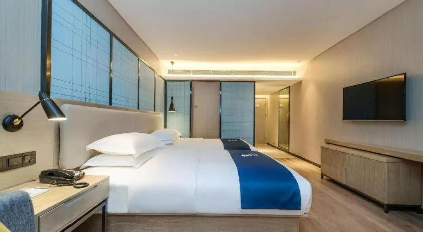 Bed in Echarm Hotel Guiyang International Convention & Exhibition Center