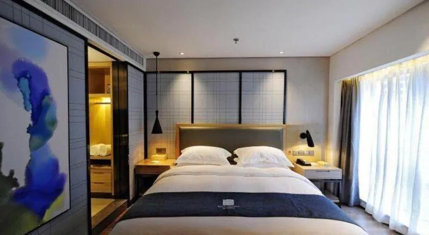 Bed in Echarm Hotel Guiyang International Convention & Exhibition Center