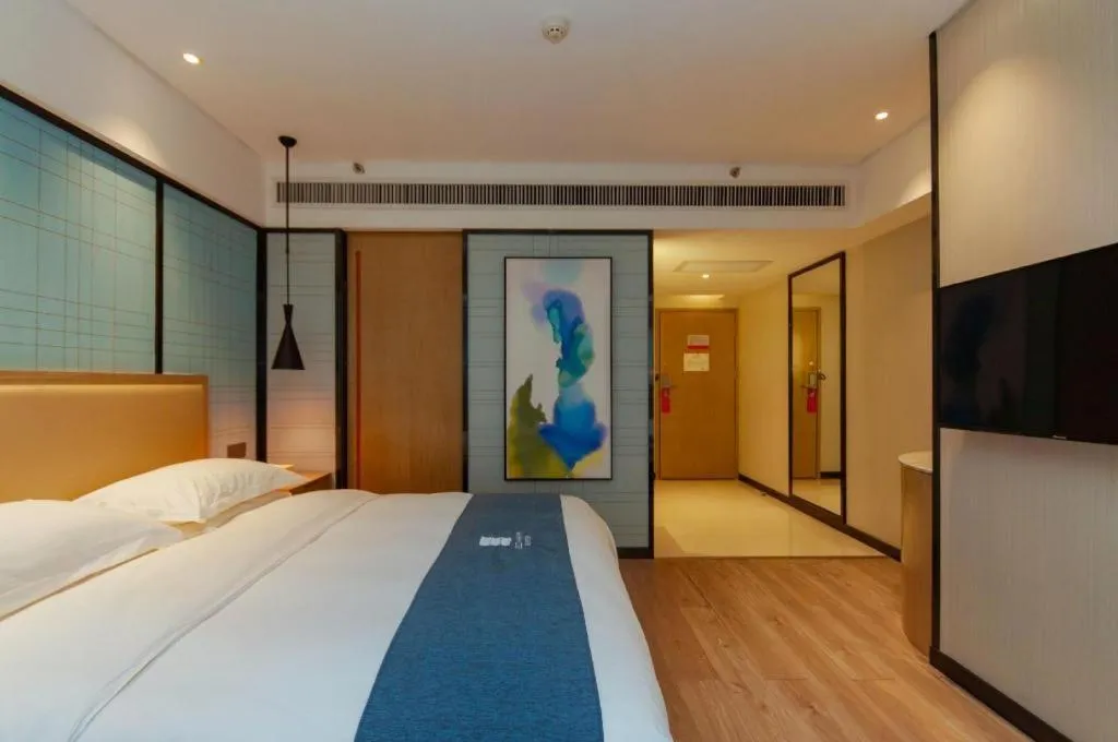 Bed in Echarm Hotel Guiyang International Convention & Exhibition Center