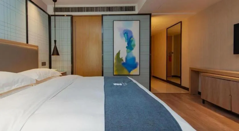 Bed in Echarm Hotel Guiyang International Convention & Exhibition Center