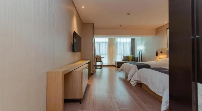 Bed in Echarm Hotel Guiyang International Convention & Exhibition Center